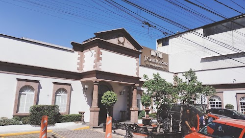 J. García López Casa Satélite